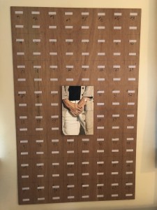 Placing the first four panels in the centre of the backing board.